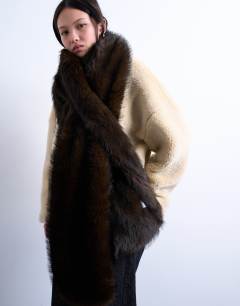 Model wearing Sophie faux fur scarf in chocolate