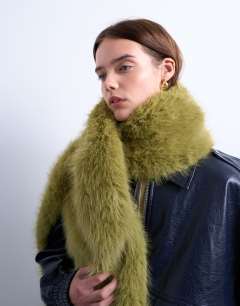 Model wearing Sophie faux fur scarf in green