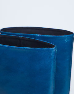Model wearing Sophie Premium leather point toe knee high boot in blue