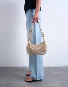 Model wearing Sparkles diamante shoulder bag in gold