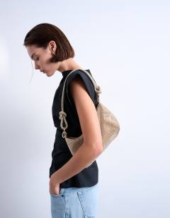 Model wearing Sparkles diamante shoulder bag in gold