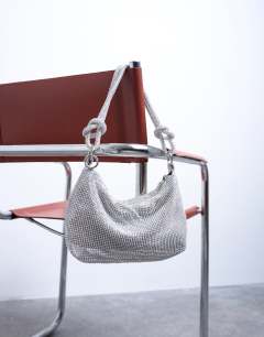 Model wearing Sparkles diamante shoulder bag in silver