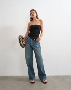 Model wearing Split side ruched asymmetric bandeau in black