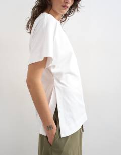 Model wearing Split side tee in white