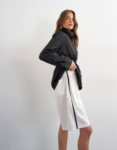 Model wearing Sport stripe detail shorts in ecru