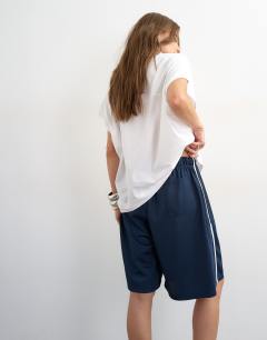 Model wearing Sport stripe detail shorts in navy