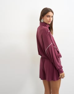 Model wearing Sporty piping half zip top co ord in burgundy