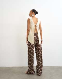 Model wearing Spot plisse wide leg trouser in brown
