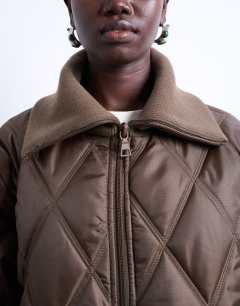 Model wearing Spread rib collar liner jacket in chocolate