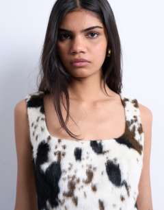 Model wearing Square neck 90s mini in faux pony hair