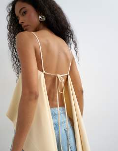 Model wearing Square neck cami with drape back detail in natural
