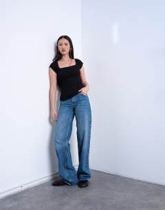 Model wearing Square neck rib cap sleeve tee in black