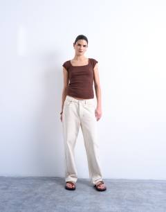 Model wearing Square neck rib cap sleeve tee in brown