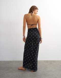 Model wearing Square sarong in black and white mono print