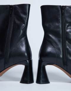 Model wearing Star Premium leather round toe block heel boot in black