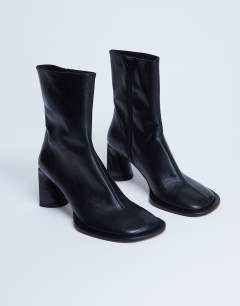 Model wearing Star Premium leather round toe block heel boot in black