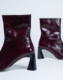 Model wearing Star Premium leather round toe block heel boot in burgundy