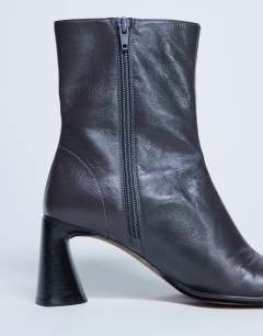 Model wearing Star Premium leather round toe block heel boot in grey