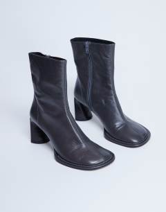 Model wearing Star Premium leather round toe block heel boot in grey
