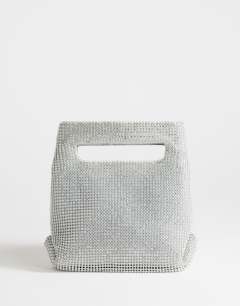Model wearing Stella diamante small grab bag in silver