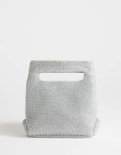 Model wearing Stella diamante small grab bag in silver