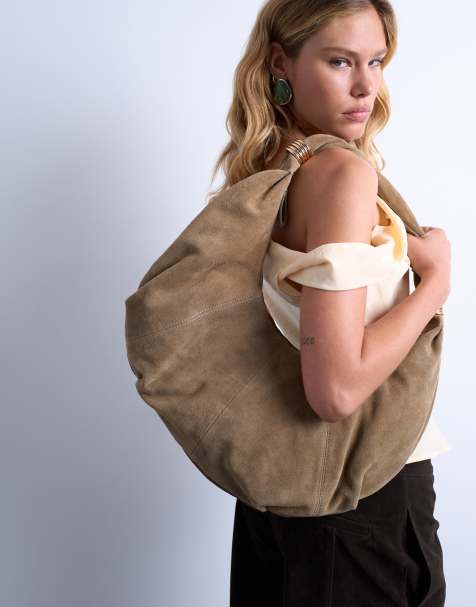 Topshop - Sterling - Schoudertas van echt suède met lage ronde bovenkant in beige - view 1