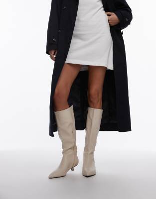 Stevie mid heel pointed toe knee high boots in off white