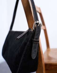 Model wearing Stina hair on real leather shoulder bag in chocolate