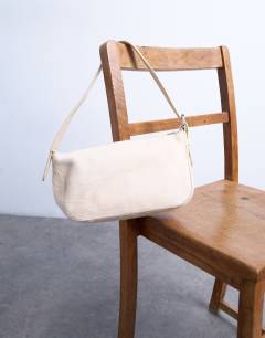 Model wearing Stina hair on real leather shoulder bag in off white 
