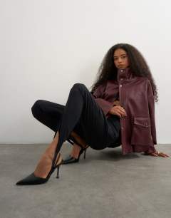 Model wearing Stirrup bengaline trouser in black