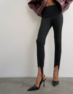 Model wearing Stirrup bengaline trouser in black