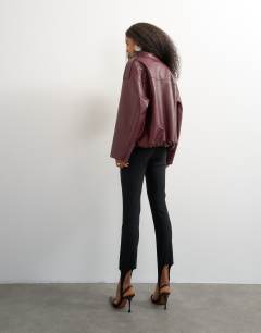 Model wearing Stirrup bengaline trouser in black