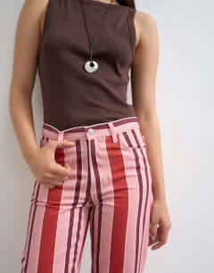 Model wearing Straight leg striped trouser in pink
