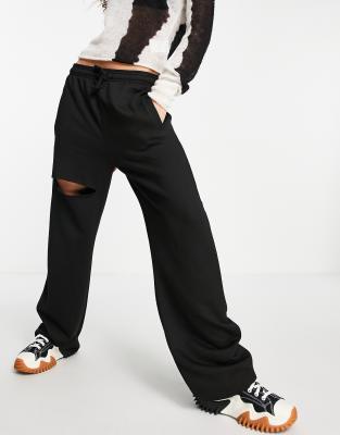 Topshop Straight Leg Sweatpants With Leg Rip In Black | ModeSens