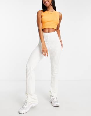 Topshop stretchy cord flared pants in ecru