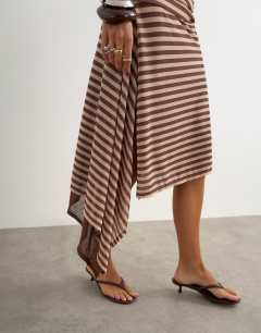Model wearing Stripe asymmetric skirt in brown