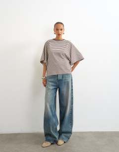 Model wearing Stripe batwing t-shirt in chocolate