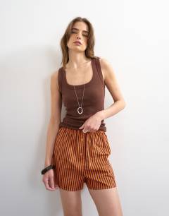 Model wearing Stripe boxer short in orange