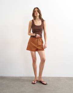 Model wearing Stripe boxer short in orange