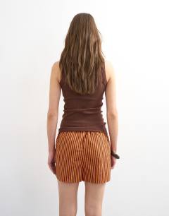 Model wearing Stripe boxer short in orange