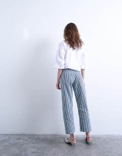 Model wearing Stripe cropped mid rise straight leg trouser in blue