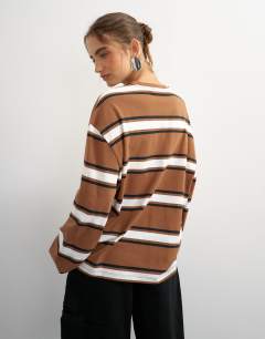 Model wearing Stripe graphic Copenhagen skater tee in brown