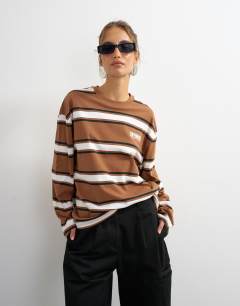 Model wearing Stripe graphic Copenhagen skater tee in brown