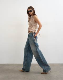 Model wearing Stripe linen look cowl ruched side top in neutral