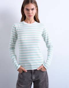 Model wearing Stripe long sleeve everyday tee in ecru