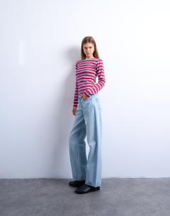 Model wearing Stripe long sleeve everyday tee in red and blue