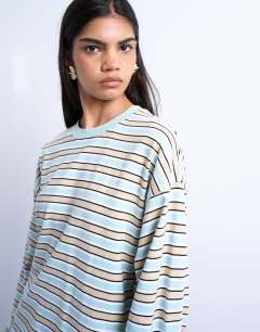 Model wearing Stripe long sleeve slouchy skater tee in beige