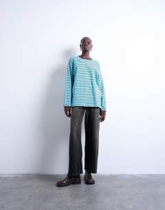 Model wearing Stripe long sleeve slouchy skater tee in blue