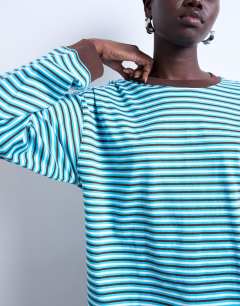 Model wearing Stripe long sleeve slouchy skater tee in blue