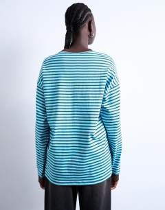 Model wearing Stripe long sleeve slouchy skater tee in blue